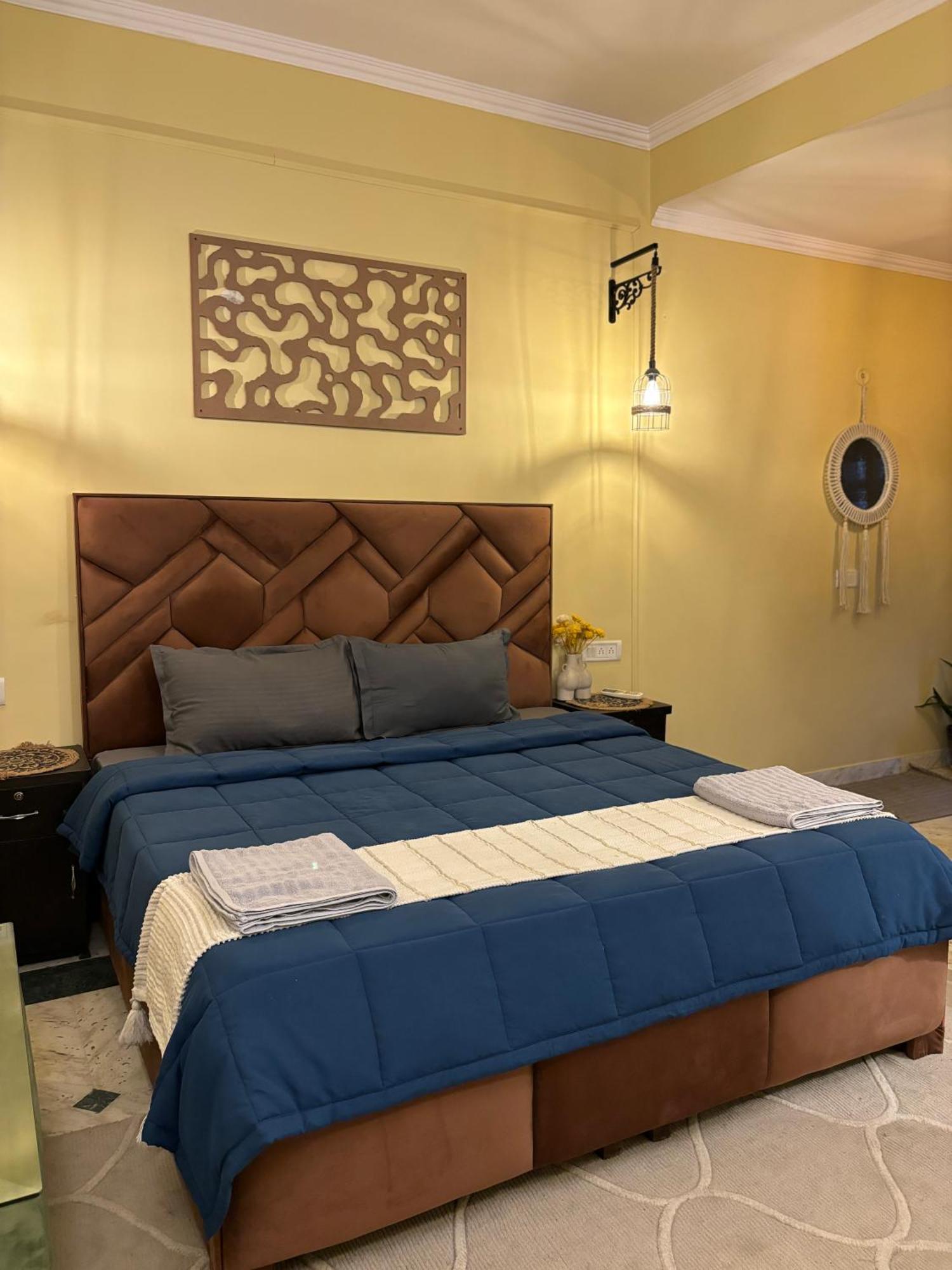 Atharva'S Homestay By Goaround Homes - Nehru Enclave Metro, South Delhi นิวเดลี ภายนอก รูปภาพ